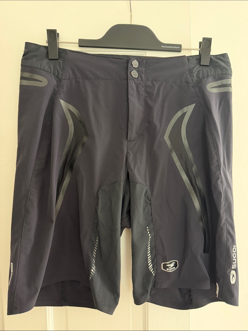 SUGOI Men’s  black  Athletic Cycling Shorts with Reflective Accents